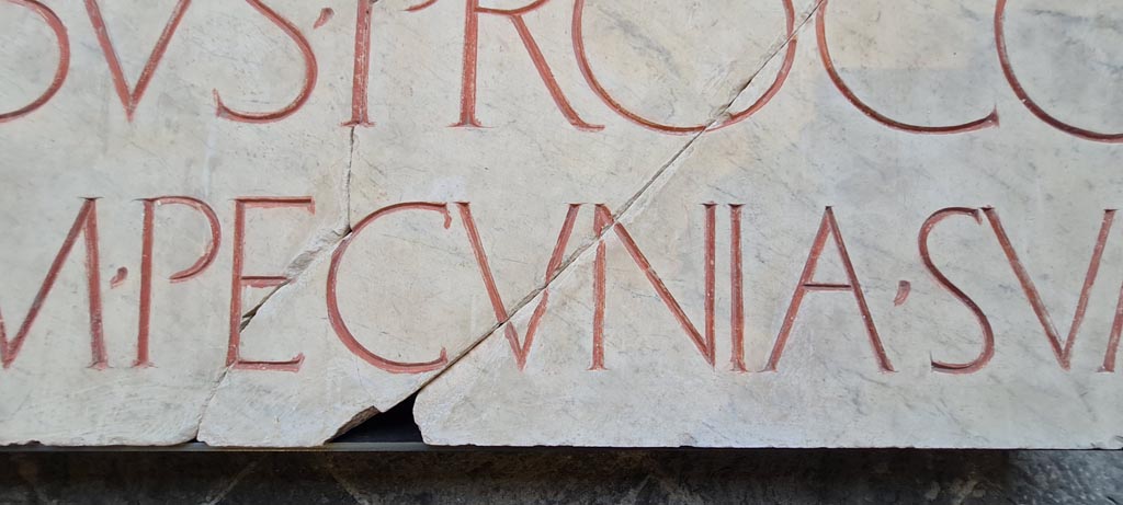 Herculaneum Basilica Noniana. April 2023. Detail from Inscription. Photo courtesy of Giuseppe Ciaramella.