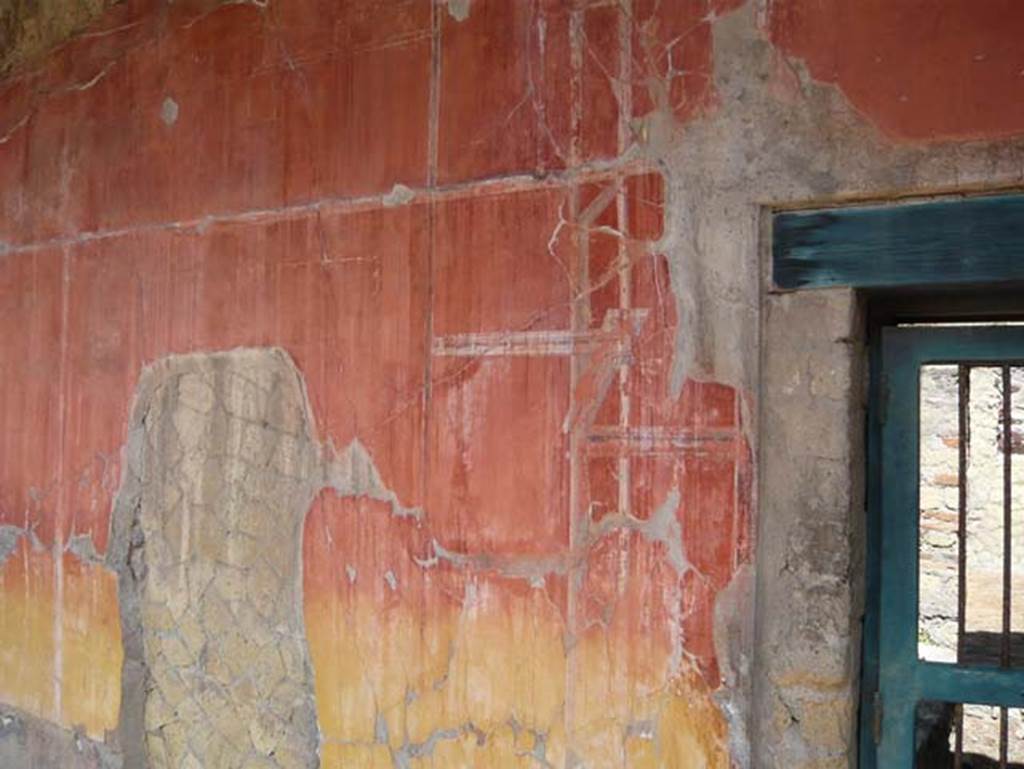 Ins. Or.I.2, Herculaneum. August 2013. Detail of painted north wall at east end on west side of doorway. Photo courtesy of Buzz Ferebee.  
