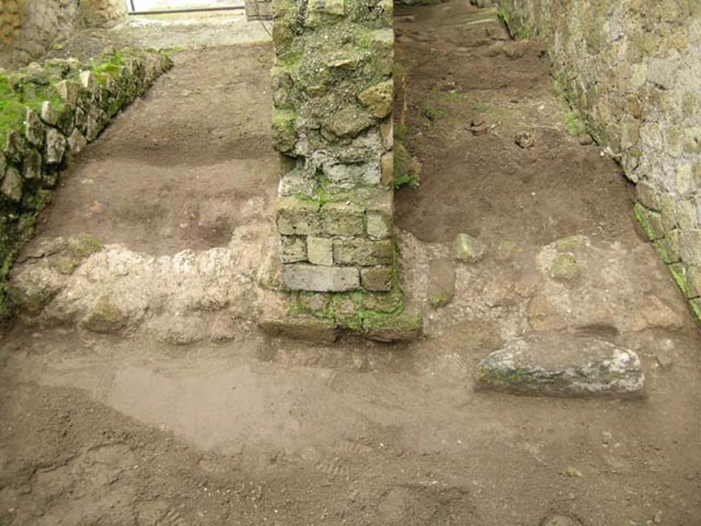 Ins. Orientalis II.7, Herculaneum. December 2004.
Looking west along area that would have been under the stairs to the upper floor, on left side of photo.
Looking west along the latrine/room on the south side of the mill-room of Ins. Or. II.8, on right side of photo.
Photo courtesy of Nicolas Monteix.