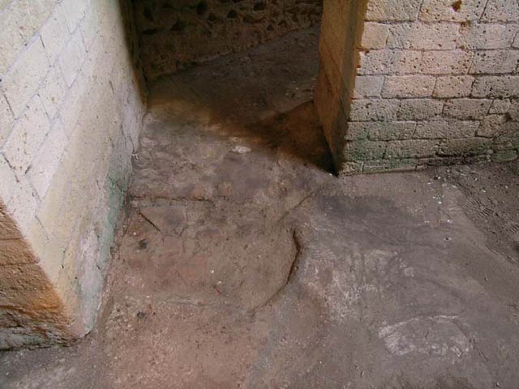 Ins Or II, 8, Herculaneum. December 2004. Room on the north side of room with oven, floor level near south wall. 
Photo courtesy of Nicolas Monteix.

