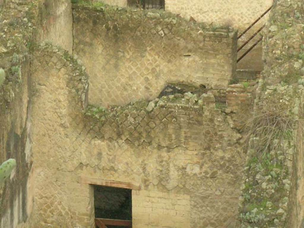 Ins. Orientalis II.11, Herculaneum. December 2004.
Looking west across rear room towards doorway, and into a room with an upper floor.
Photo courtesy of Nicolas Monteix.
