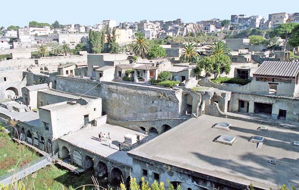 Herculaneum, October 2001. Looking north-west from the roadway above Suburban Baths, on right. On the left is the Sacred Area with the Terrace of Balbus, lower centre. Photo courtesy of Peter Woods.
