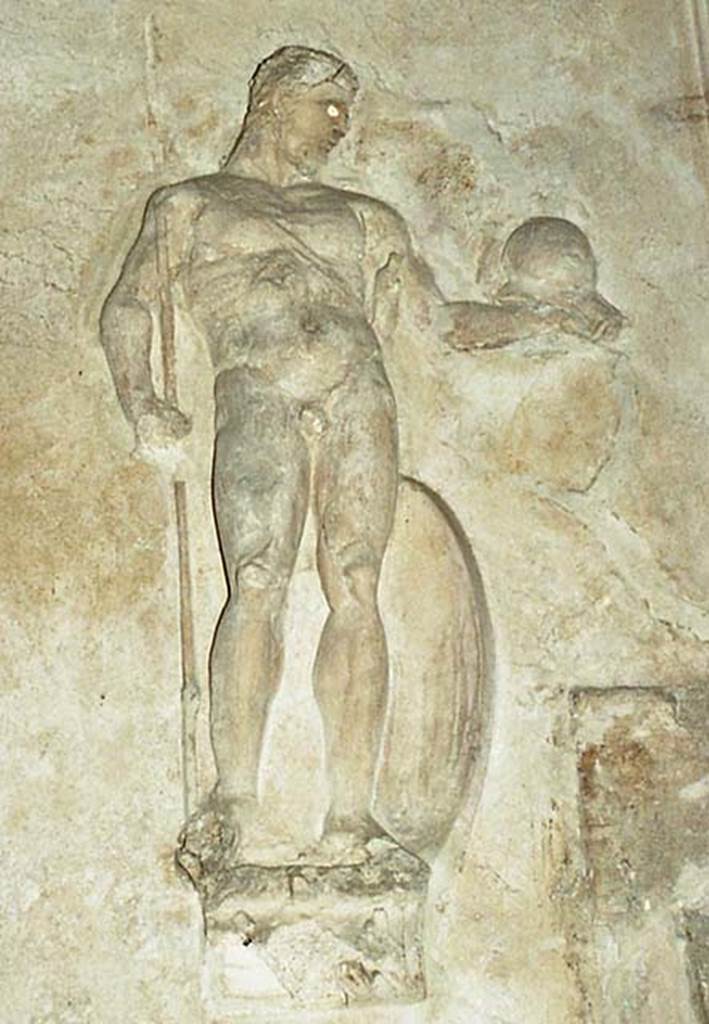 Suburban Baths, Herculaneum. October 2001.
Detail of stucco warrior with spear, from west wall of tepidarium. Photo courtesy of Peter Woods.