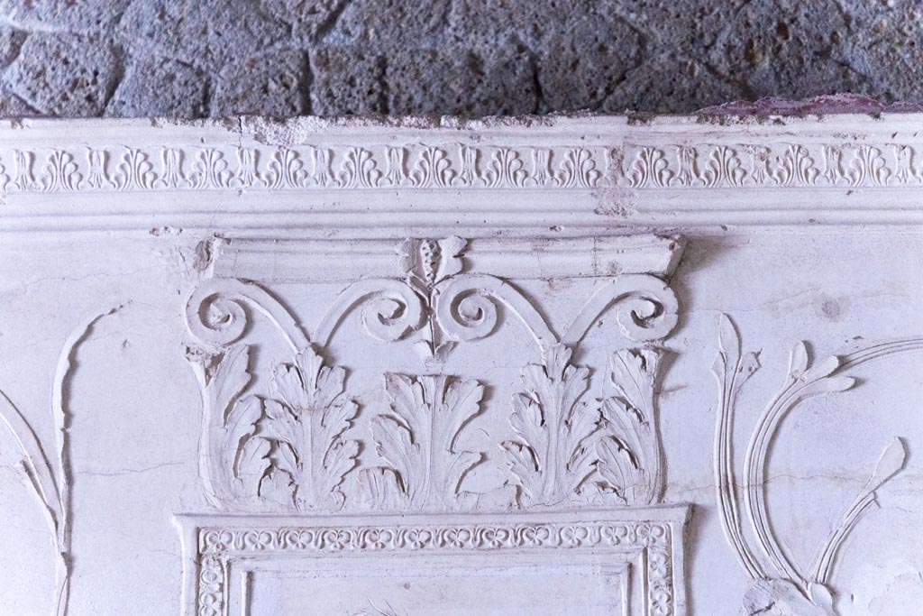 Herculaneum Suburban Baths. October 2023. Detail of stucco decoration on east end of upper north wall. Photo courtesy of Johannes Eber.
