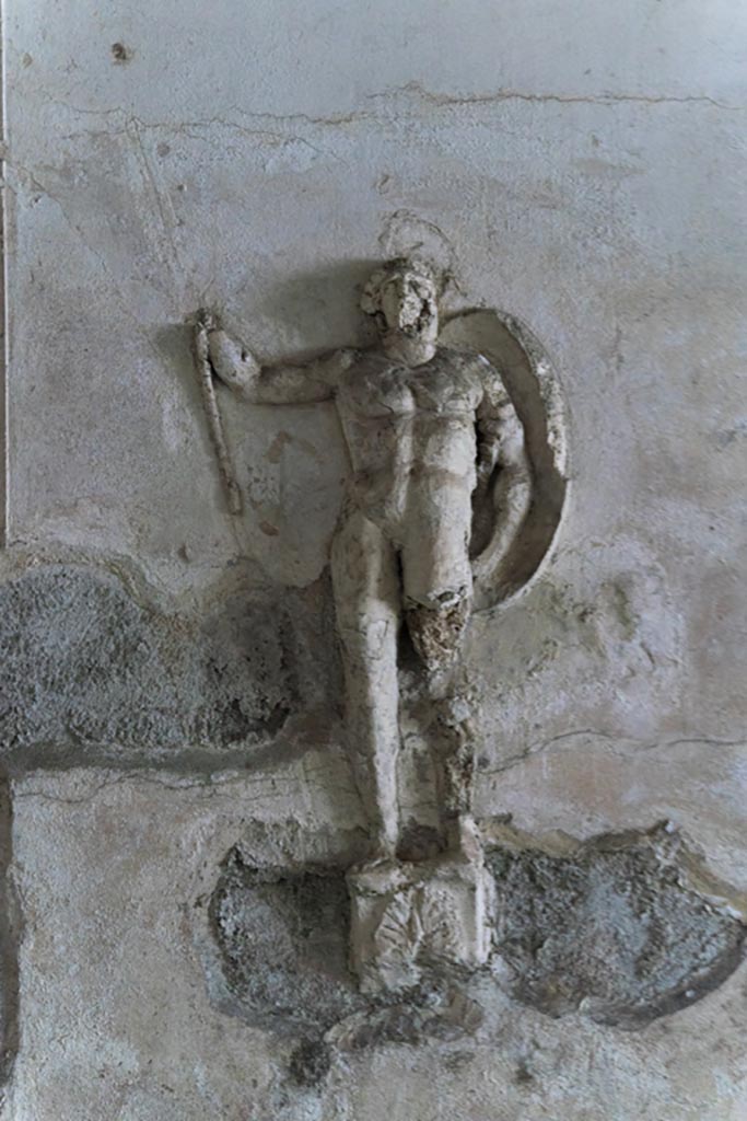 Herculaneum Suburban Baths. October 2023. 
Tepidarium, stucco warrior from north end of east wall. Photo courtesy of Johannes Eber. 
