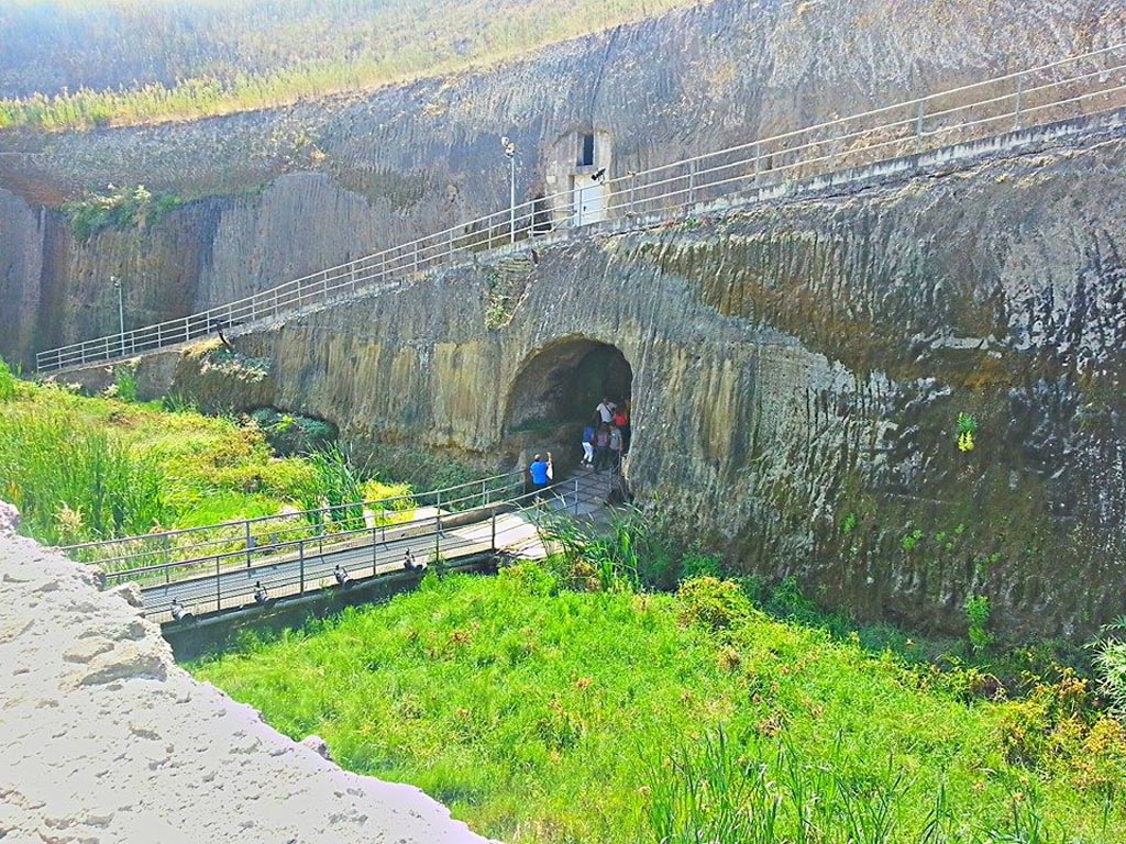 Herculaneum, photo taken between October 2014 and November 2019. 
Tunnel exit/entrance through solidified ash on south side of beachfront. Photo courtesy of Giuseppe Ciaramella.

