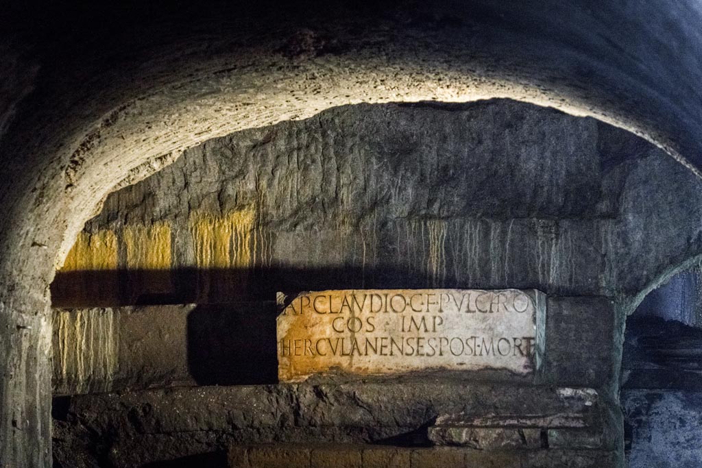 Herculaneum Theatre. October 2023.
Inscription to AP Claudio C F Pulchro after his death, in situ underground. Photo courtesy of Johannes Eber.