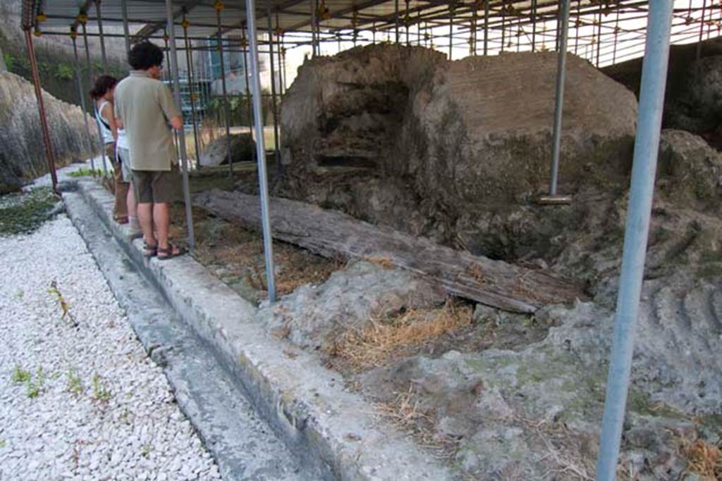 Villa dei Papiri, Herculaneum. July 2010. Looking along part of the monumental structure.
Photo courtesy of Michael Binns.