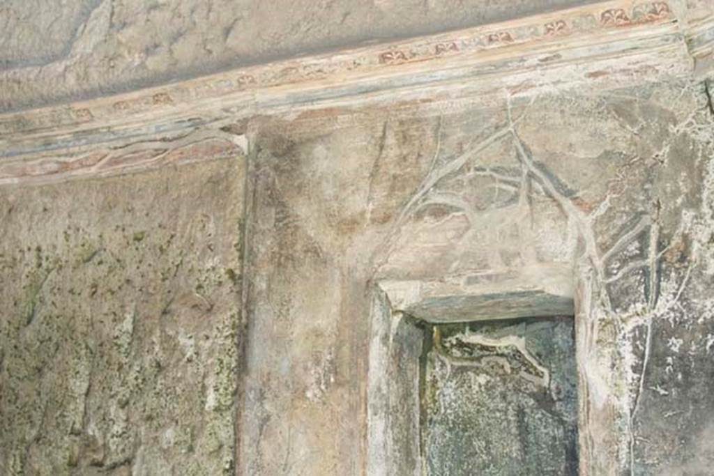 South-western baths, Herculaneum. July 2010. Rectangular niche. Photo courtesy of Michael Binns.
On the left can be seen the area of the window, still with its pyroclastic material in situ.
