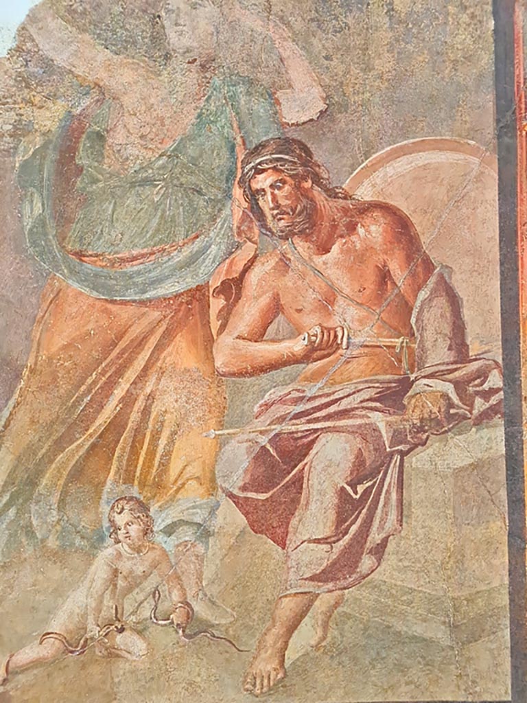 Herculaneum Augusteum. April 2023. Detail from painting showing The infant Hercules strangling the serpents, inv.9012. 
On display in “Campania Romana” gallery in Naples Archaeological Museum.  Photo courtesy of Giuseppe Ciaramella.
