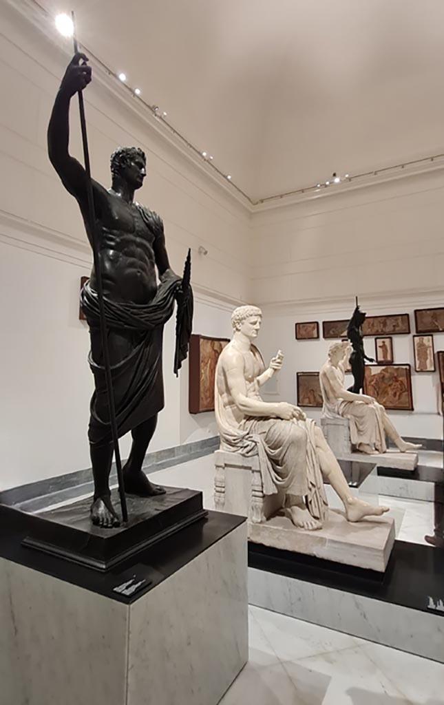 Herculaneum Augusteum. April 2023. 
Looking across statues. Photo courtesy of Giuseppe Ciaramella.
