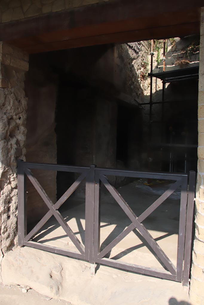 II.2 Herculaneum, October 2023. 
Doorway in west wall of portico, leading to a second smaller peristyle and rooms around the atrium. Photo courtesy of Klaus Heese.
