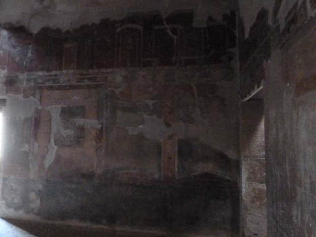 III.11 Herculaneum. May 2010. Room 8, north wall and north-east corner, with doorway to atrium in east wall. 
