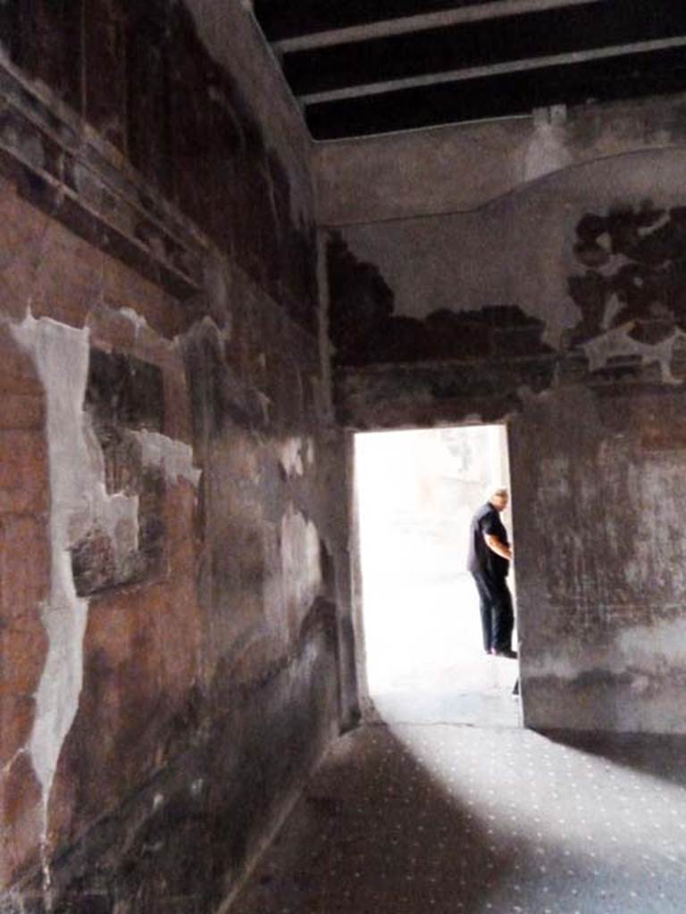 III.11 Herculaneum. May 2010. Room 8, looking east towards doorway to atrium, in north-east corner. 