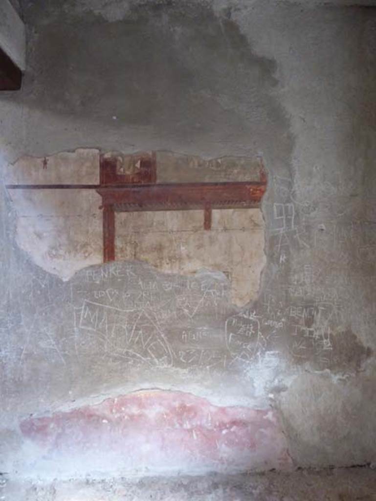 III.16, Herculaneum, October 2014. Room 3, north wall. Photo courtesy of Michael Binns.
The wall of this room in this house must surely be the most relevant according to a graffito found in the Basilica at Pompeii �
CIL IV 1904 - �O walls, you have held up so much tedious graffiti that I am amazed that you have not already collapsed in ruin�.
