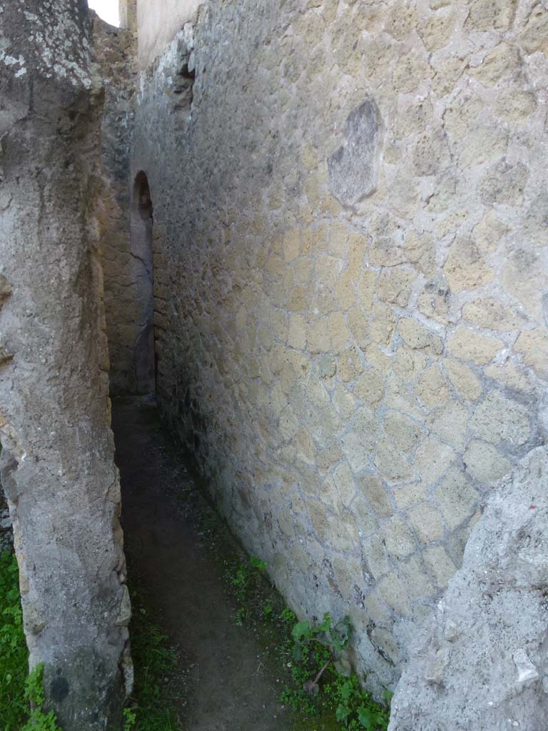 III.19/18/1, Herculaneum. October 2012. 
Corridor leading to north side of Room 3, apodyterium, or waiting room. Photo courtesy of Michael Binns.


