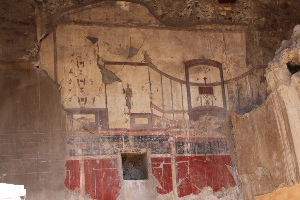 IV.15/16, Herculaneum, September 2017. 
Looking towards painted decoration on upper west wall of room 9. Photo courtesy of Klaus Heese. 
