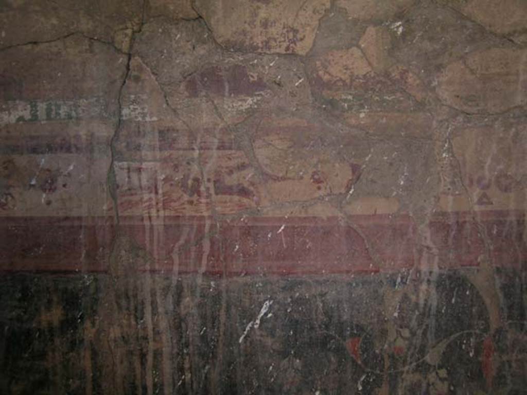 IV.15/16, Herculaneum, May 2005. Detail of painted decoration from west wall of room 9.
Photo courtesy of Nicolas Monteix.
