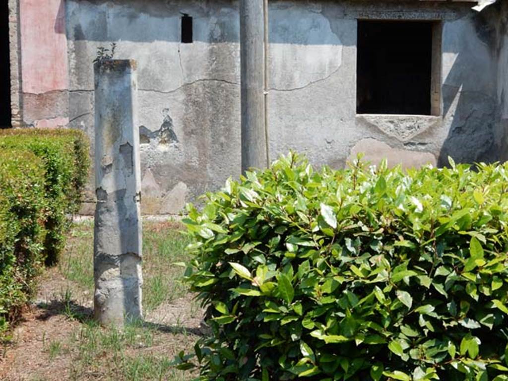 IV.21, Herculaneum. May 2018.
Garden 32, looking north across garden area towards east side of central doorway and exterior wall of Cryptoporticus 28.
Photo courtesy of Buzz Ferebee. 
