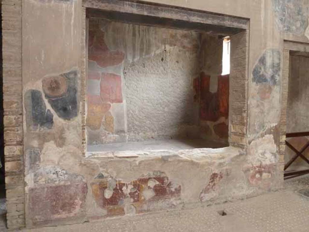V.1 Herculaneum. May 2010. Window in east wall of atrium, looking into tablinum. 