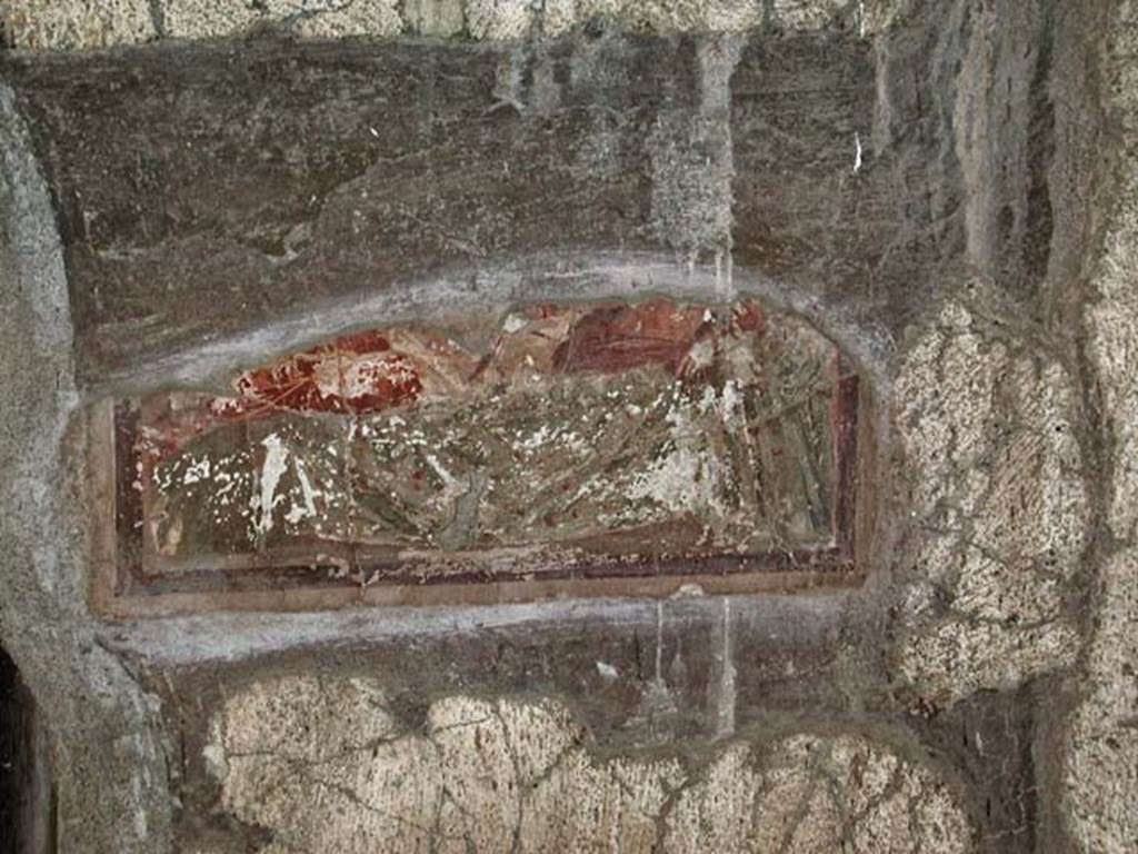 V.7/6, Herculaneum. September 2003. Upper room, looking towards west wall with remains of a painted panel.  
Photo courtesy of Nicolas Monteix.
