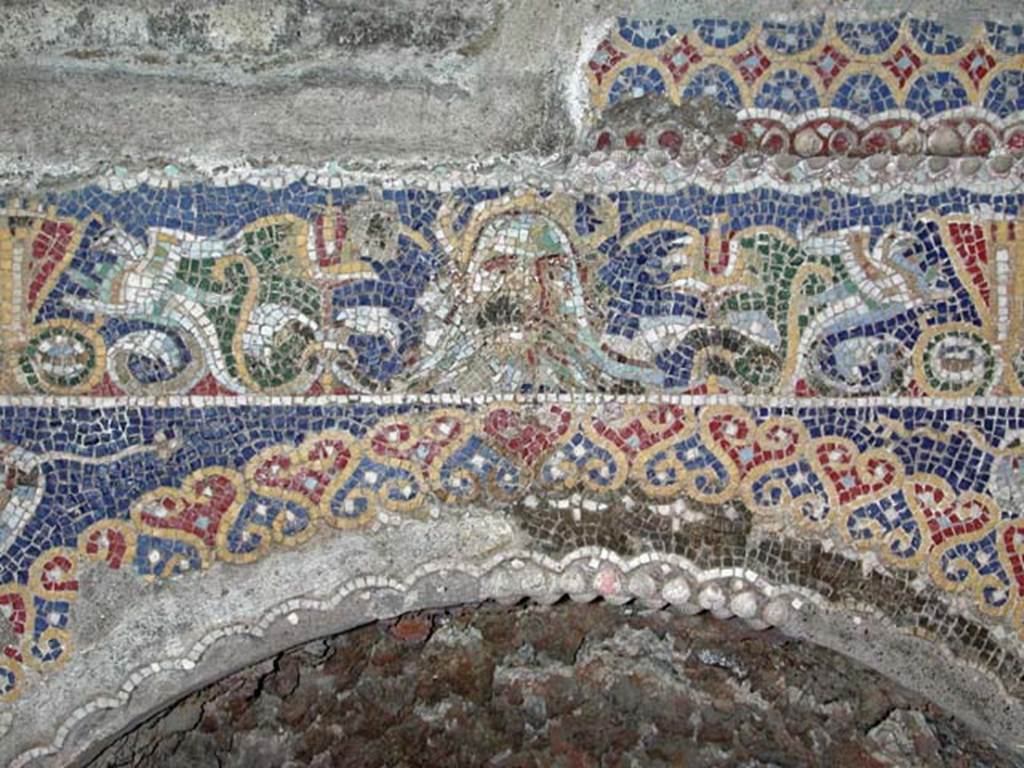 V 7, Herculaneum, September 2003. Detail of glass paste mosaic, including Oceanus, at centre of niche on north wall. 
Photo courtesy of Nicolas Monteix.


