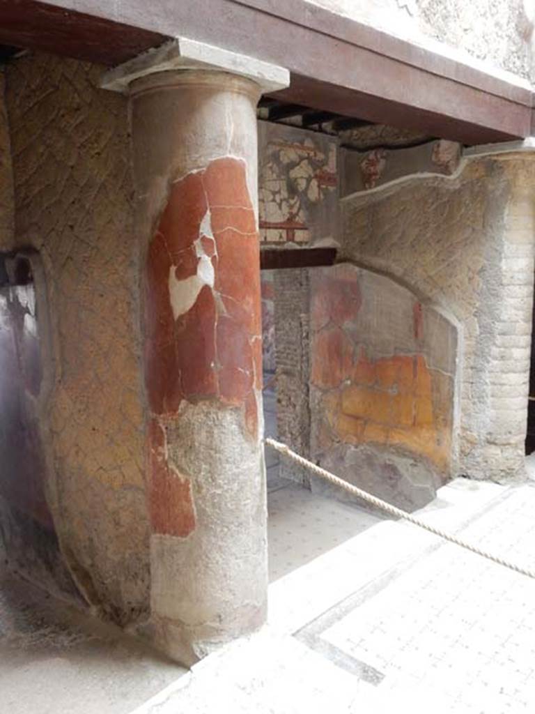 V.8 Herculaneum. May 2018. Looking west from raised courtyard.
Centre right is the north wall of the small tablinum, room 3. 
On the left is the north wall of the small corridor on its south side. Photo courtesy of Buzz Ferebee. 

