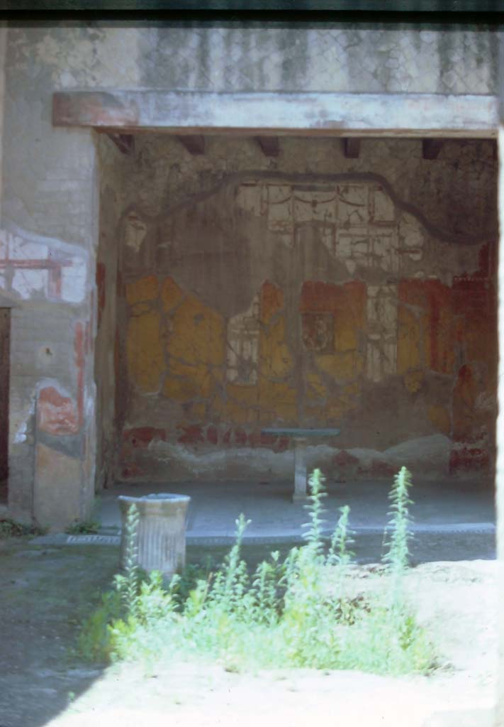 V.11 Herculaneum. 7th August 1976. Looking south across atrium towards tablinum.
Photo courtesy of Rick Bauer, from Dr George Fay�s slides collection.

