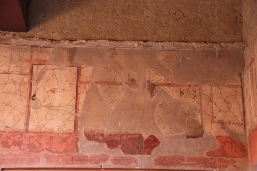V.15 Herculaneum, October 2020. 
Looking towards painted decoration from upper east wall, towards south-east corner of atrium. Photo courtesy of Klaus Heese.
