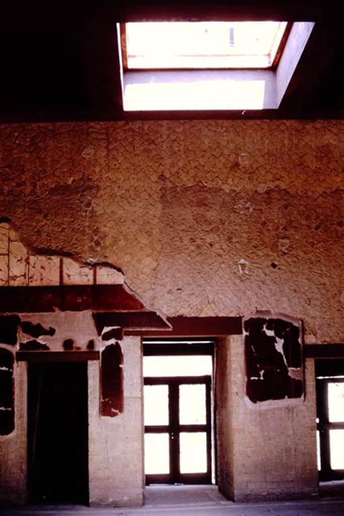 V.15 Herculaneum, House of Bicentenary, 1964. 
Looking across atrium towards entrance doorway.  
The doorway on the left leads into a room connecting to V.14. Photo by Stanley A. Jashemski.
Source: The Wilhelmina and Stanley A. Jashemski archive in the University of Maryland Library, Special Collections (See collection page) and made available under the Creative Commons Attribution-Non-Commercial License v.4. See Licence and use details.
J64f1160

