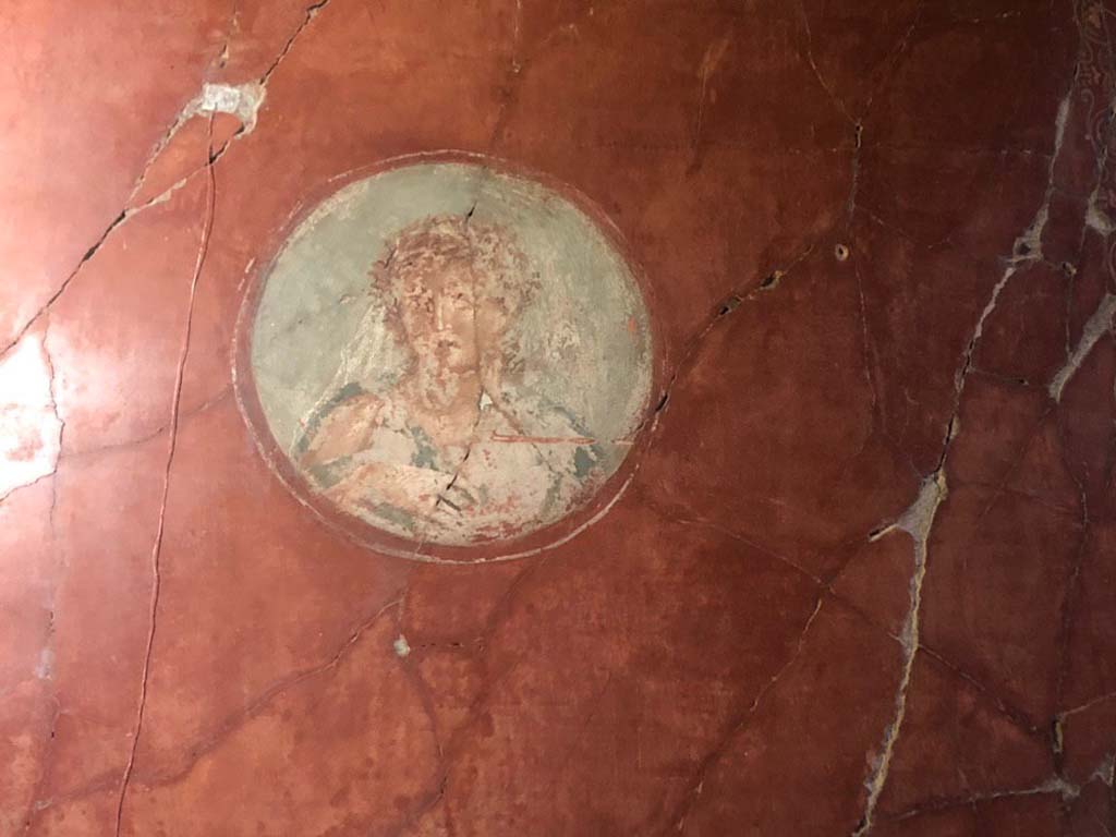 V.15 Herculaneum. October 2019. West wall of tablinum at north end, medallion with painting of a Maenad.
Photograph � Parco Archeologico di Pompei.

