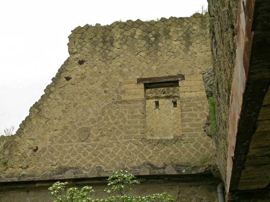 V.15, Herculaneum. May 2005. Upper west wall of portico/garden area.
Looking through window towards west wall of room of the �so-called� cross.
Photo courtesy of Nicolas Monteix.
