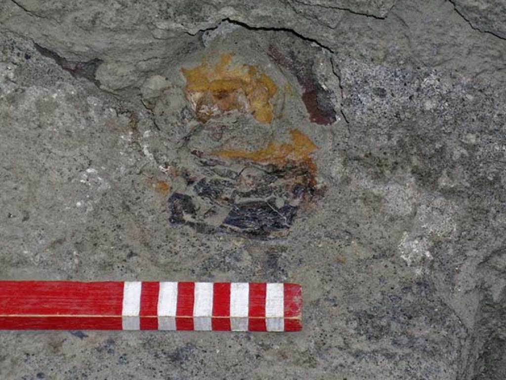 VI.12, Herculaneum. September 2004.  Detail from investigation in north-west corner of rear room.
Photo courtesy of Nicolas Monteix.
