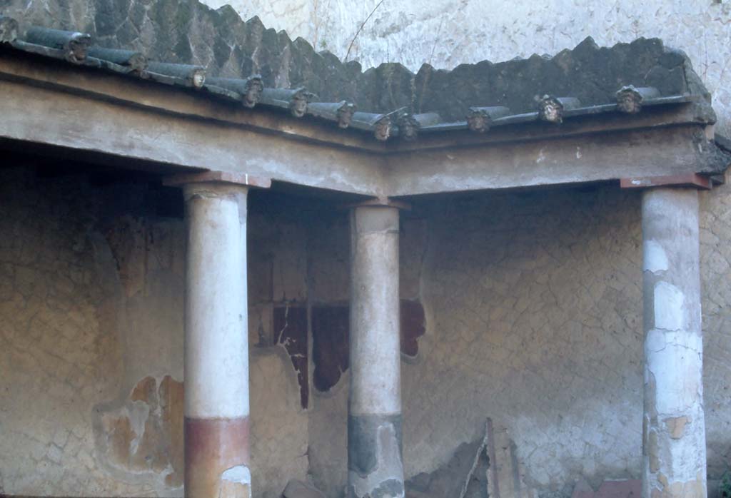 VI.17 Herculaneum. 4th December 1971. Looking towards south-east corner of peristyle.
Note: the water-spouts positioned on the roof.  Photo courtesy of Rick Bauer, from Dr George Fay�s slides collection.
