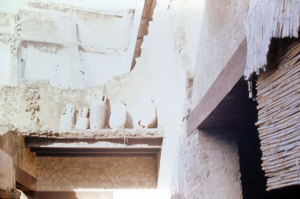 VI.17 Herculaneum. 4th December 1971. Looking towards upper area of north-west corner of portico.
Room 13 is on the right. Photo courtesy of Rick Bauer, from Dr George Fay�s slides collection.

