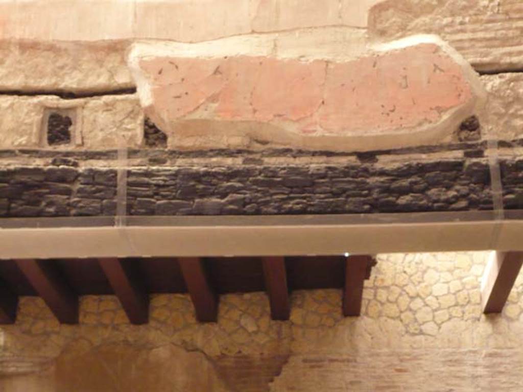 Ins.VI.21, Herculaneum.  May 2009. Detail of carbonized beams from upper floor. 
Photo courtesy of Buzz Ferebee.
