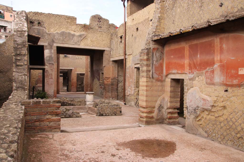 VI.29 Herculaneum. October 2020. 
Triclinium 11, at the west end of the north wall is the doorway to room 12. Looking west from triclinium 11. Photo courtesy of Klaus Heese.
