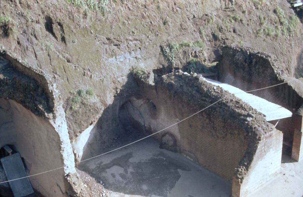 Ins. Orientalis II.4/19, Palaestra, Herculaneum, 4th December 1971. 
Looking north-east, from access bridge, along north side of the cryptoporticus and rooms at east end of upper loggia.
Photo courtesy of Rick Bauer, from Dr George Fay’s slides collection.
