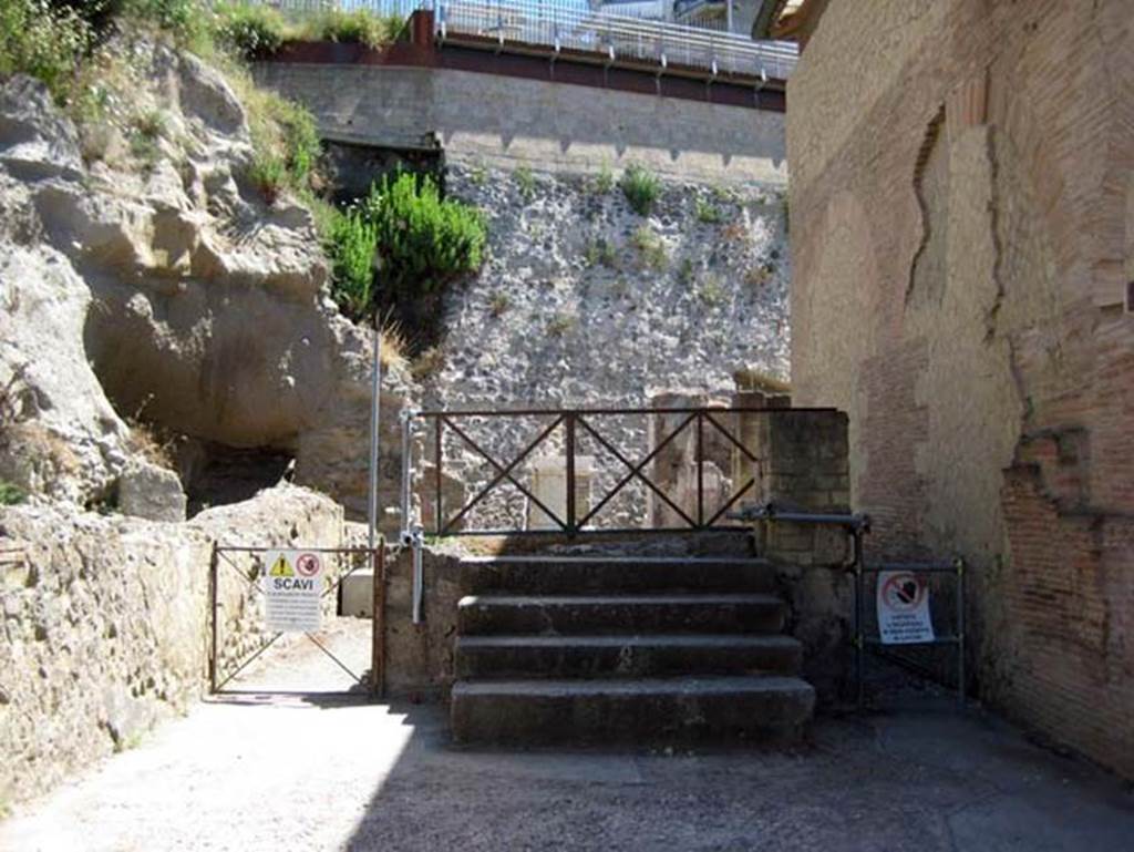 Cardo III Superiore, Herculaneum. June 2011. Looking north to steps and rectangular structure in the northern end of the Cardo.
Photo courtesy of Sera Baker.
