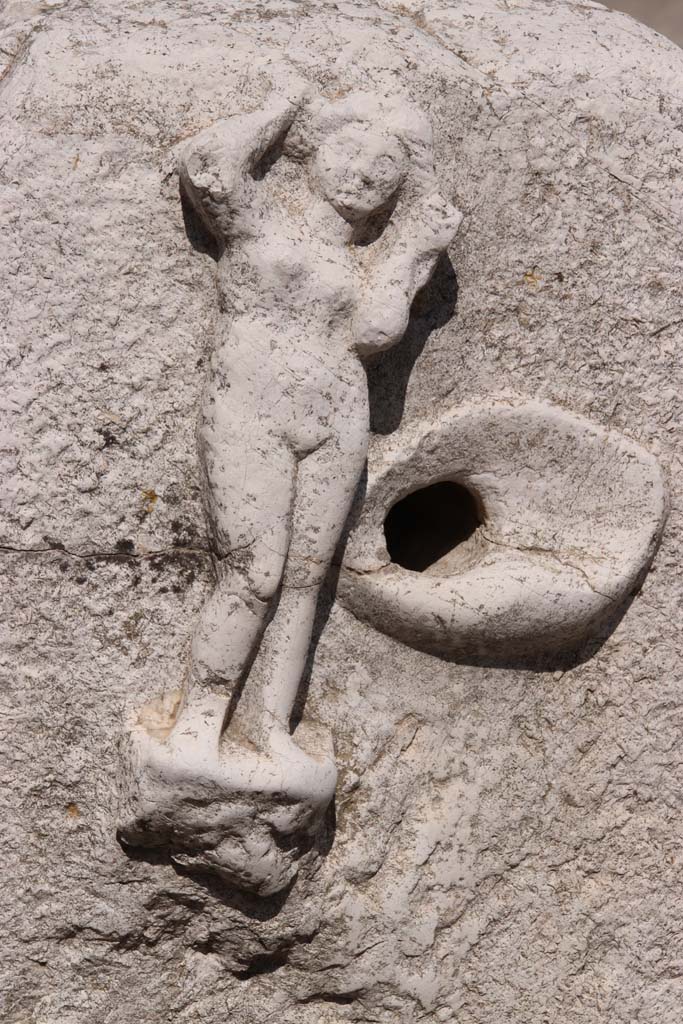 Decumanus Maximus, Herculaneum. September 2019. Looking towards relief of Venus at west end of fountain. 
Photo courtesy of Klaus Heese. 
